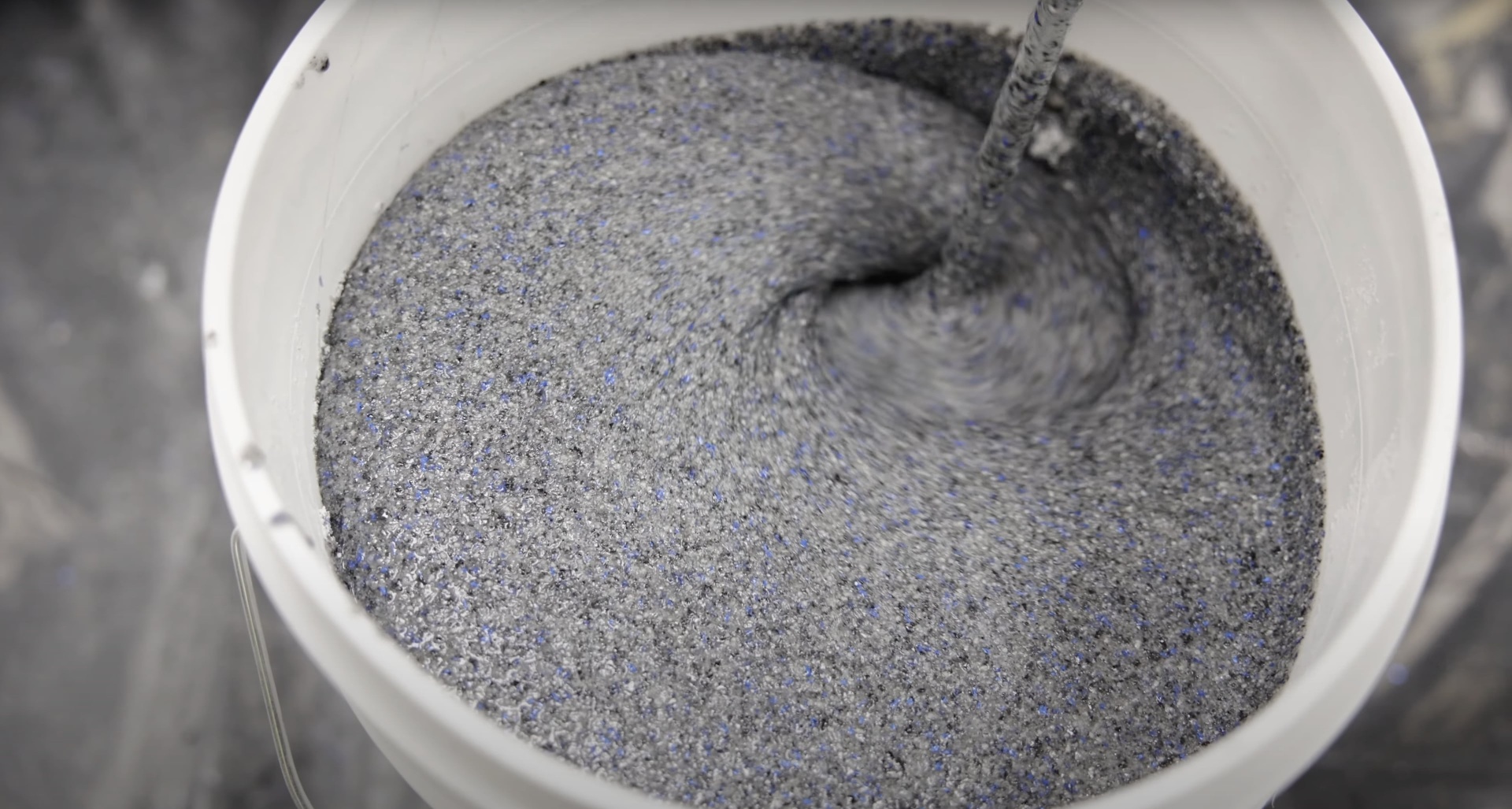 High-quality concrete mix preparation for residential and commercial projects Fresh concrete mix in bucket ready for pouring showing quality concrete materials for construction in Waterbury CT
