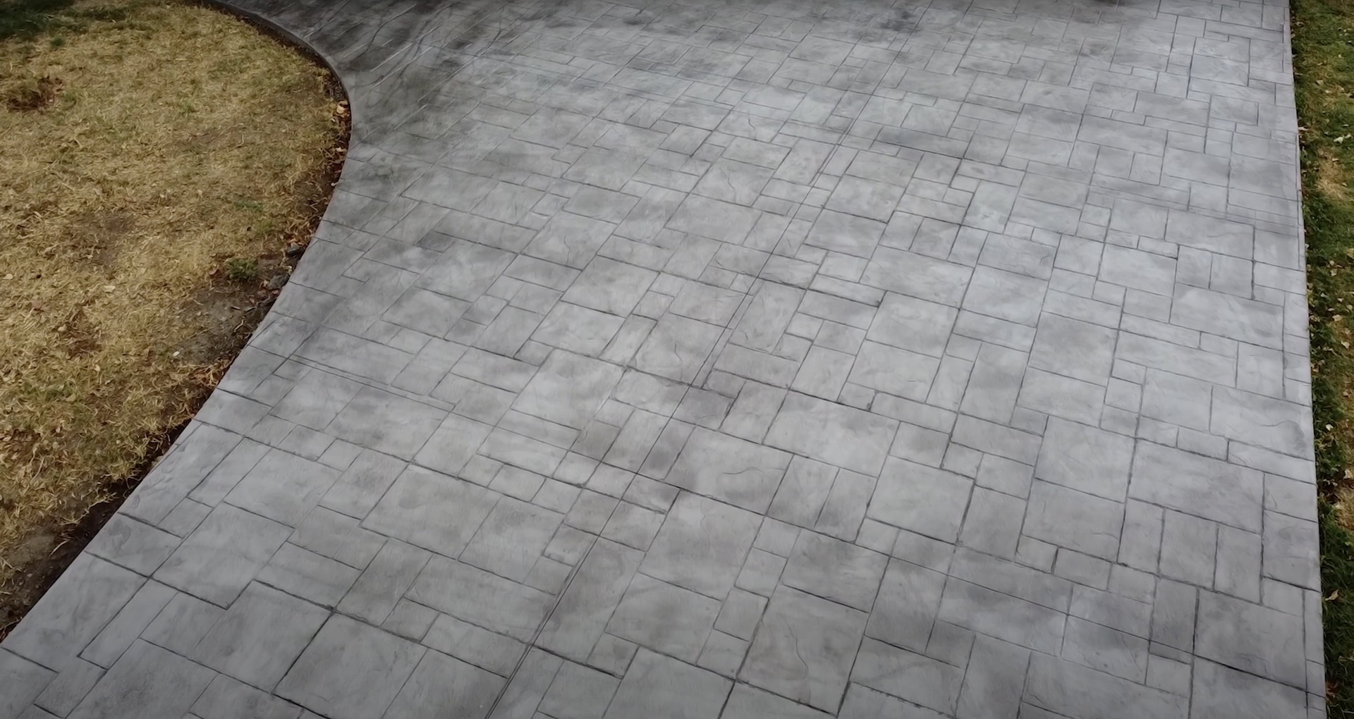 Decorative concrete and paver installation options for residential patios Beautiful decorative concrete paver installation showcasing pattern options for patios in Waterbury Connecticut